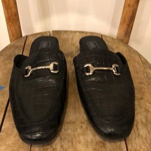 Black backless loafers men’s mules